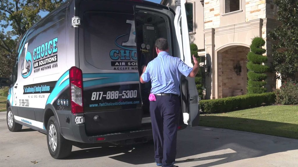 1st Choice Air Solutions technician unloading van at a residential home